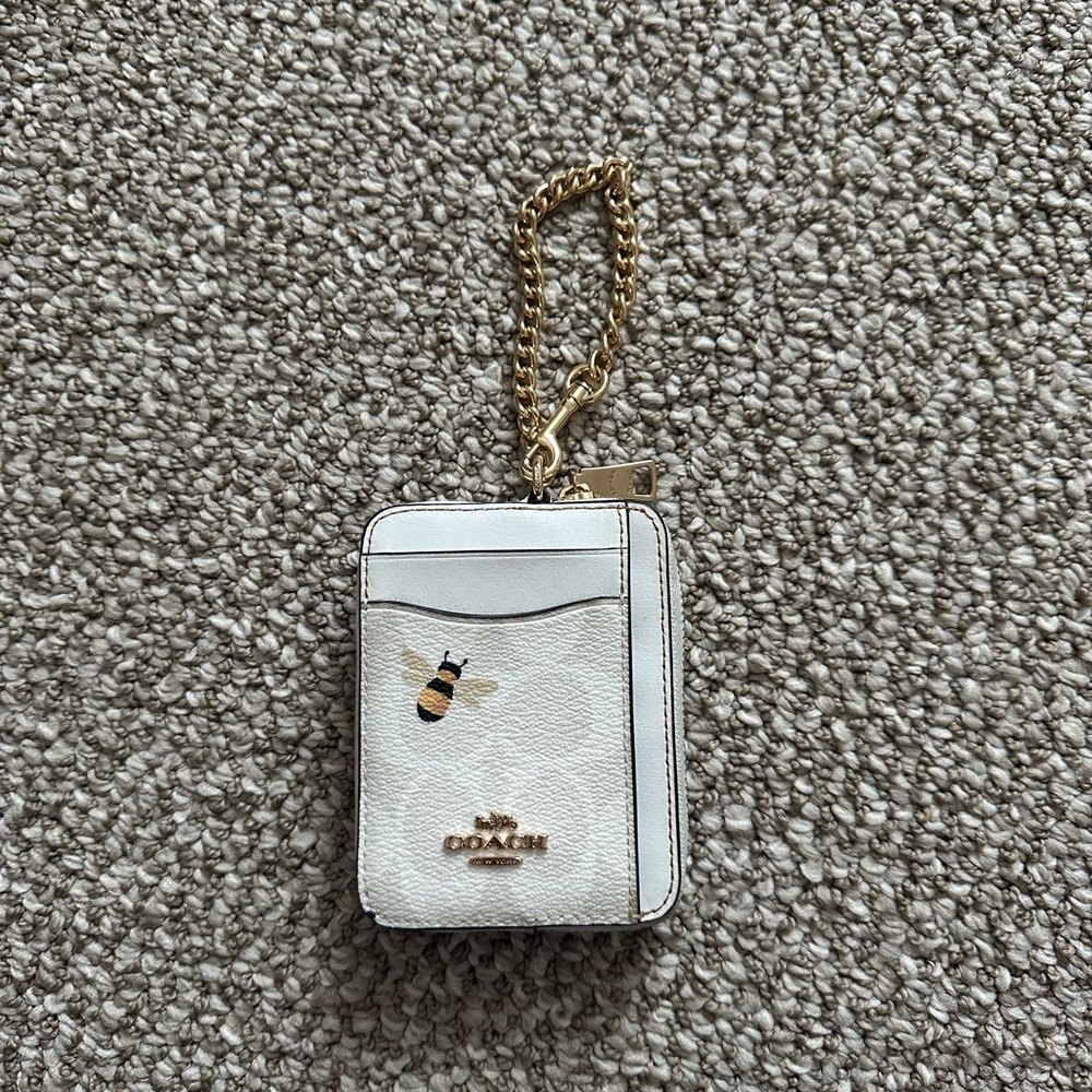 Coach White Card Holder with gold hardware and bee design